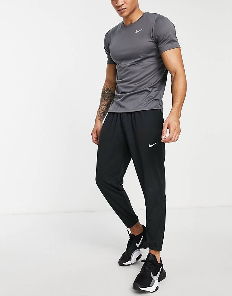 Nike Running Challenger Dri-FIT knitted sweatpants in black - BLACK